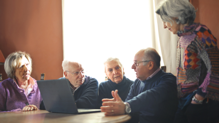 Older men and women talking